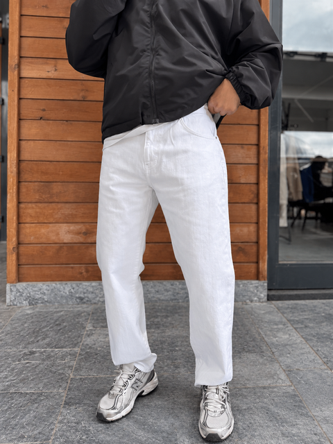 White Relaxed Fit Denim Jeans by BROEK, front view