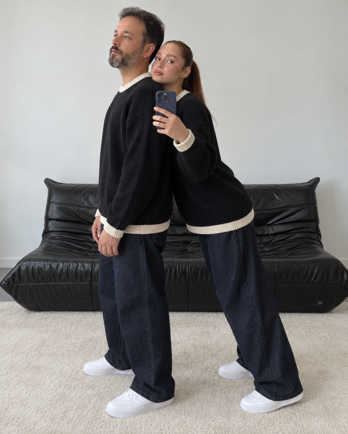 Both BROEK models wearing the black Contrast Trim Knit Sweater