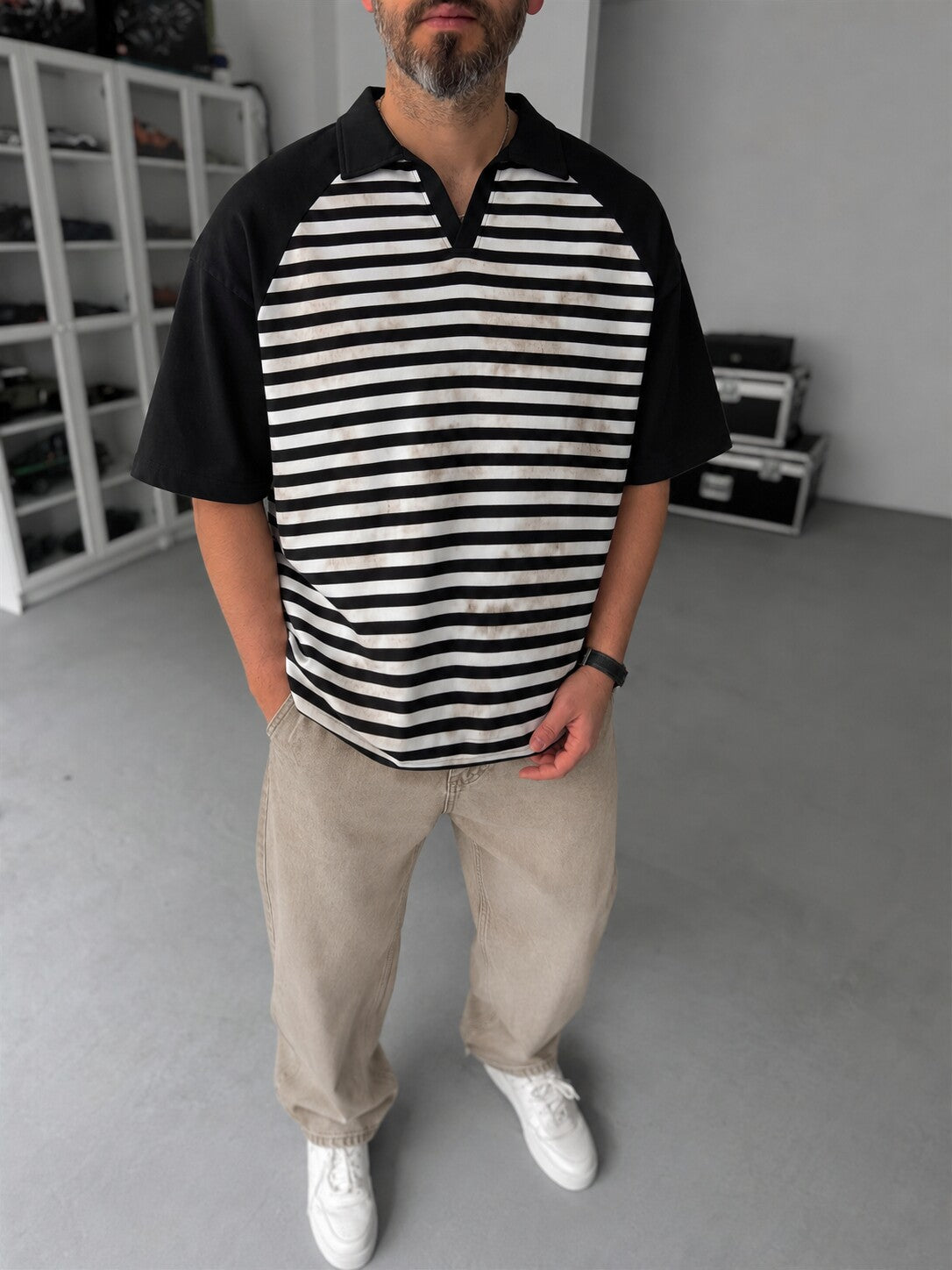 Men's Vintage Striped Polo in black and off-white - front view