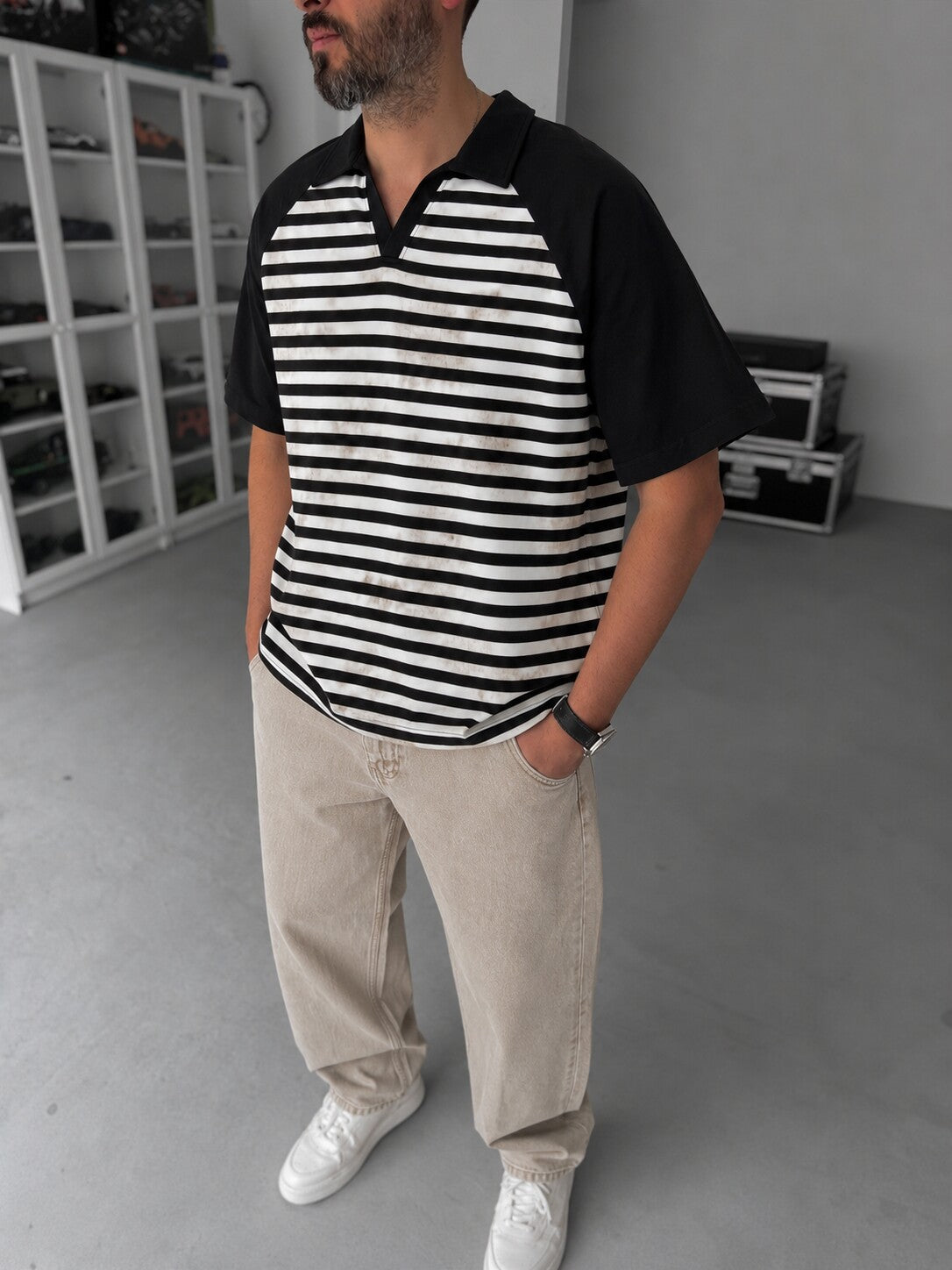 Men's Vintage Striped Polo in black and off-white - angled view