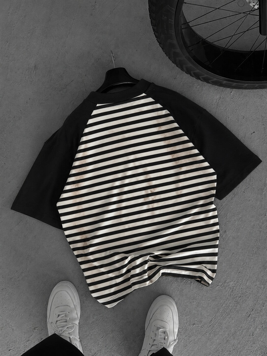 Vintage Striped Polo in black and off-white - flat lay