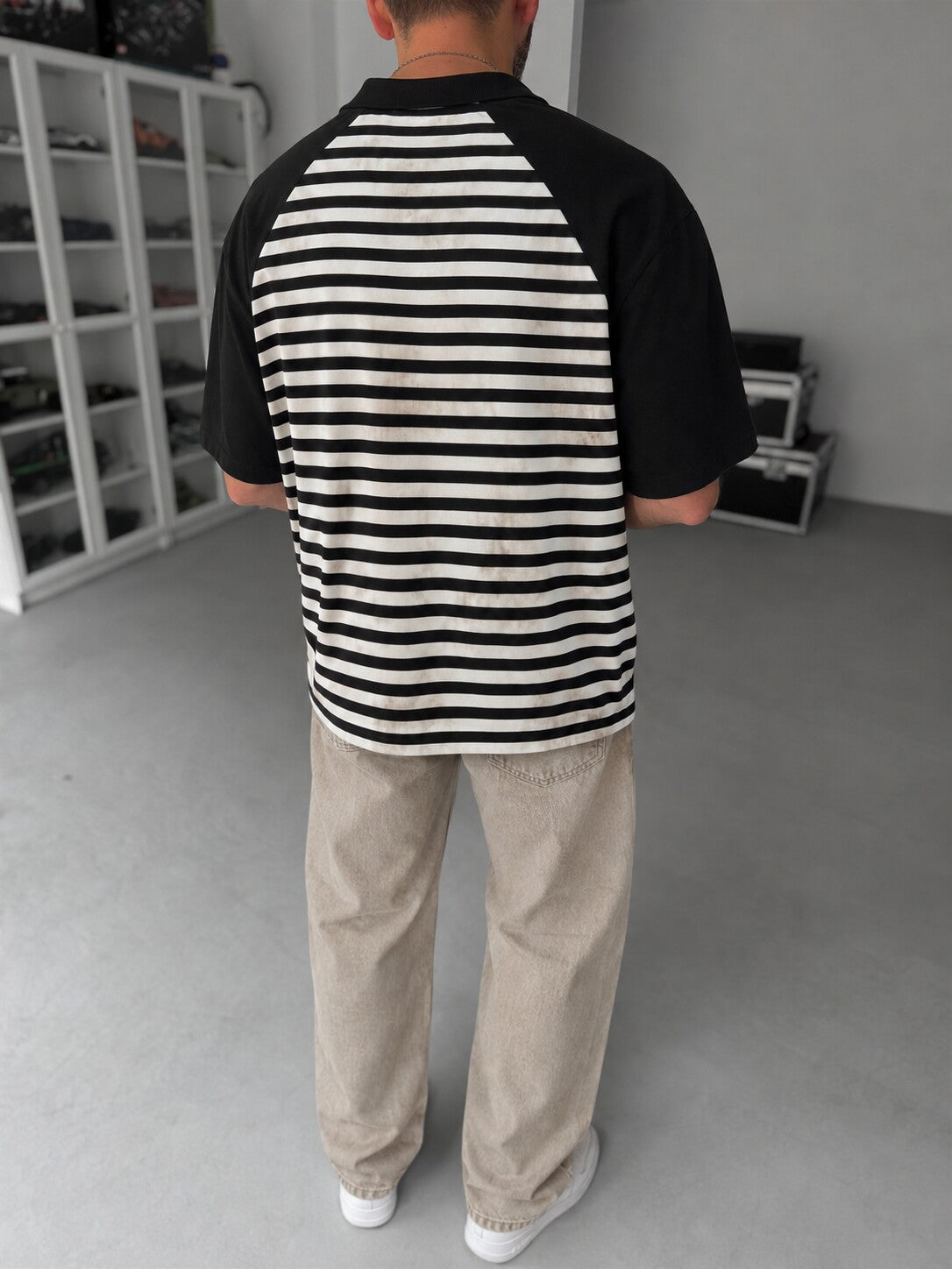 Men's Vintage Striped Polo in black and off-white - back view