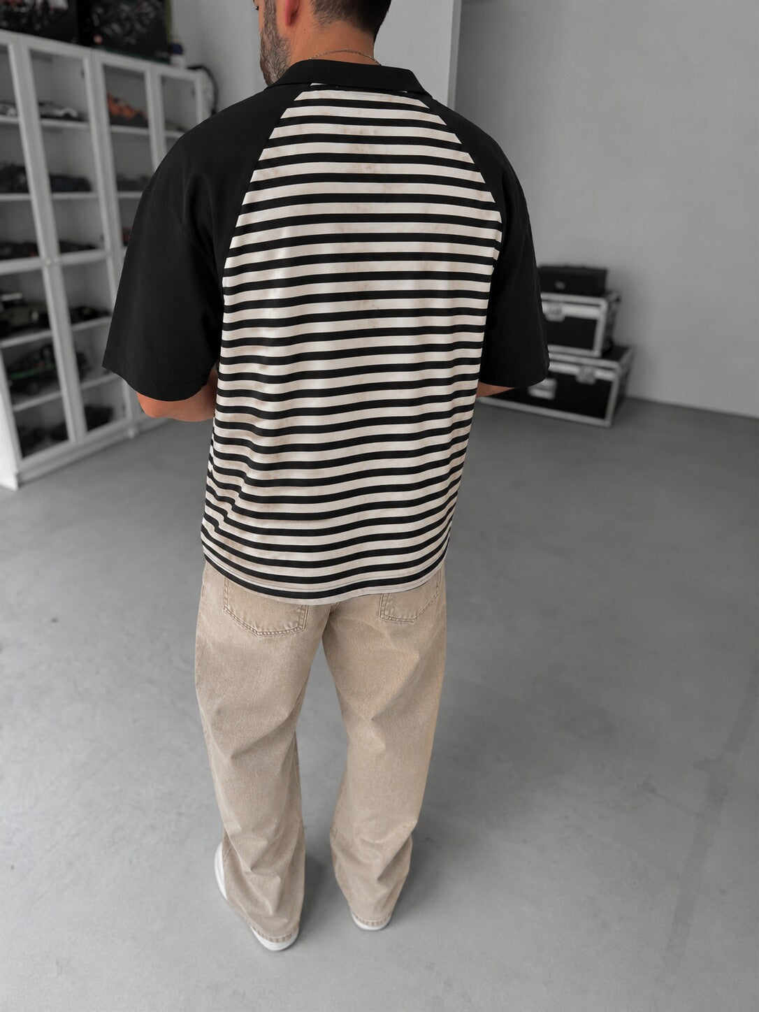 Men's Vintage Striped Polo in black and off-white - rear angle