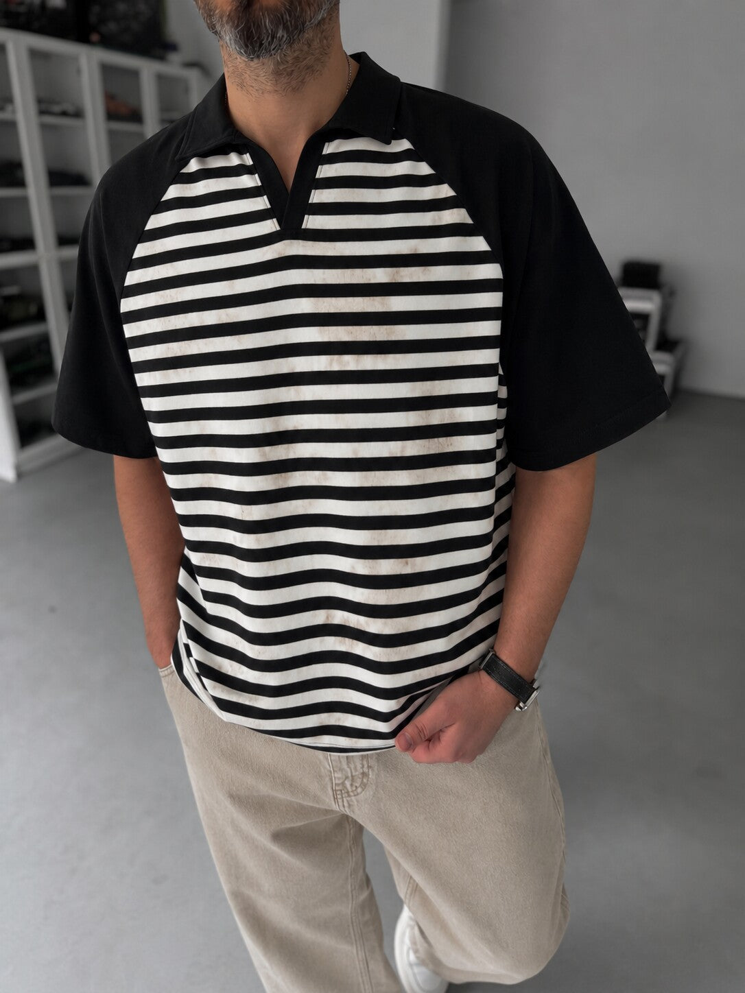 Vintage Striped Polo in black and off-white - front detail