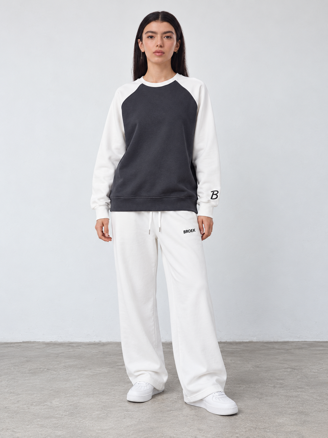 CC01 full outfit, crewneck fully untucked, female model wearing M