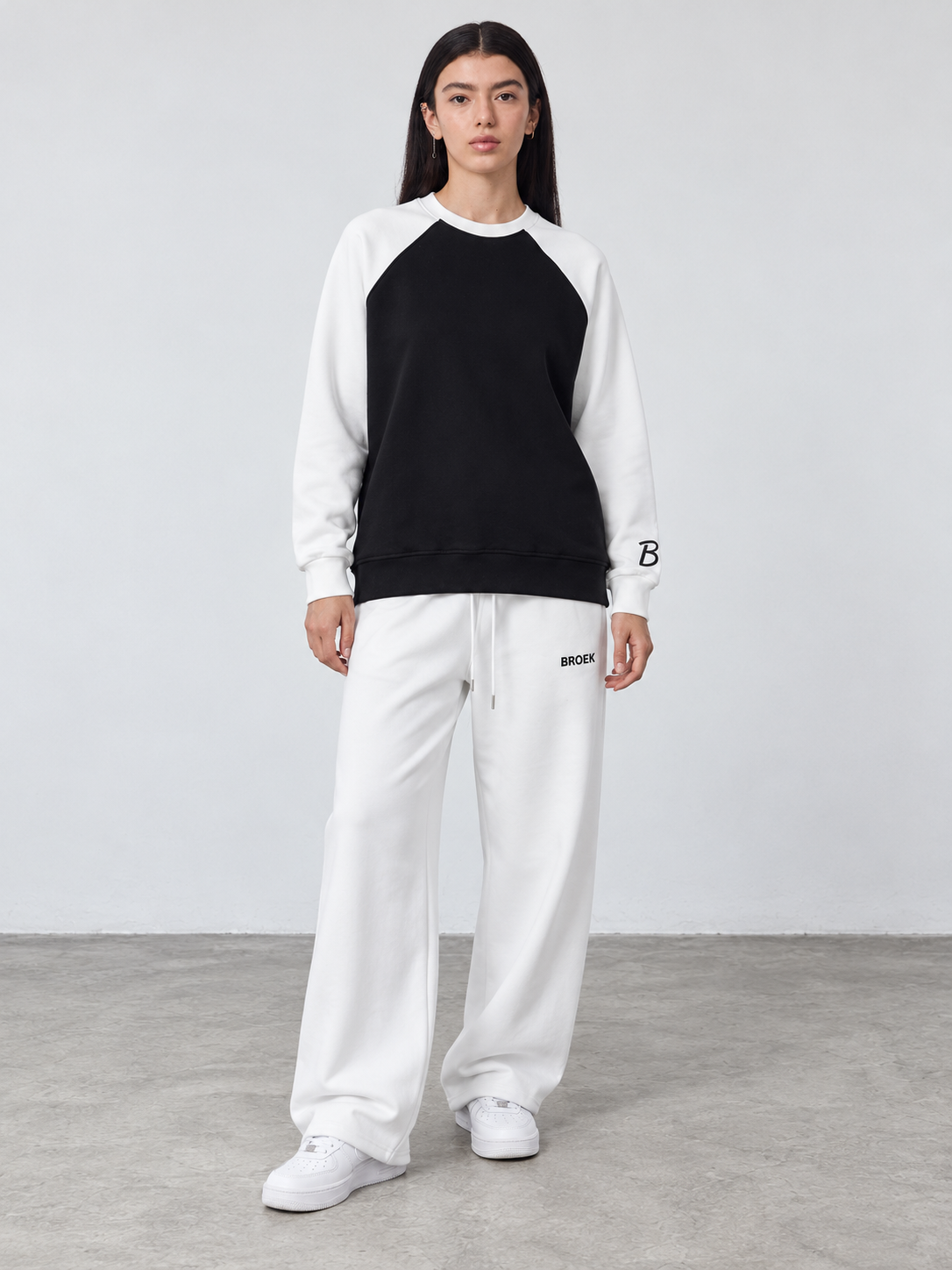 CC03 full outfit, crewneck fully untucked, female model wearing M