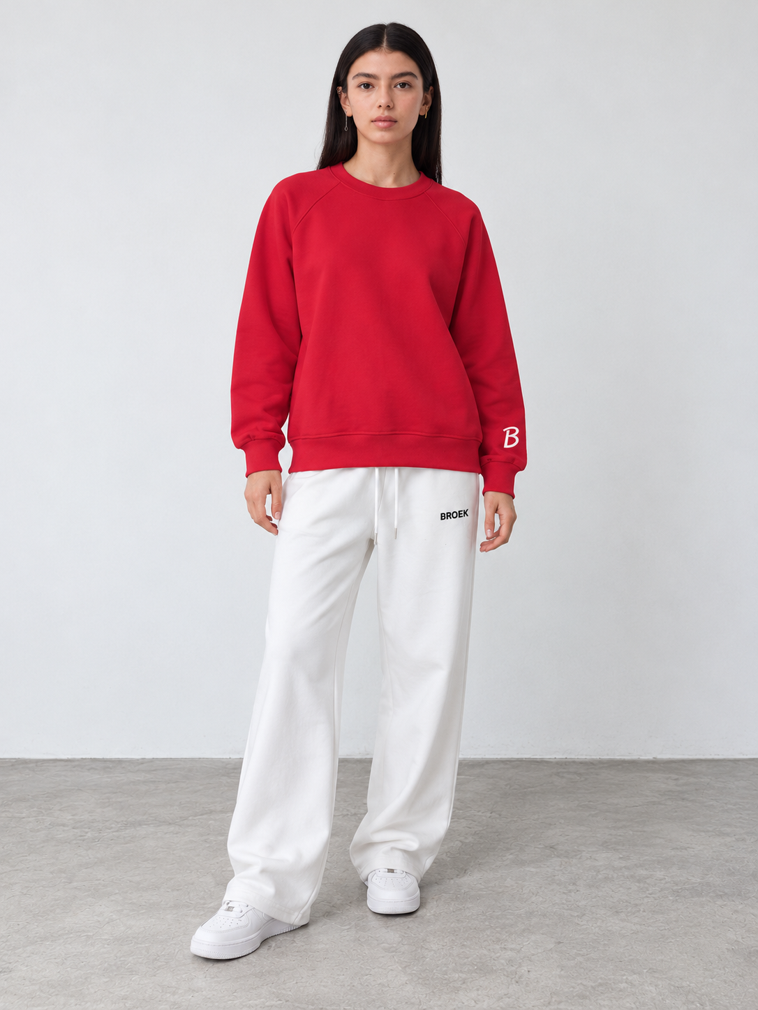 CS01 full outfit, crewneck fully untucked, female model wearing M