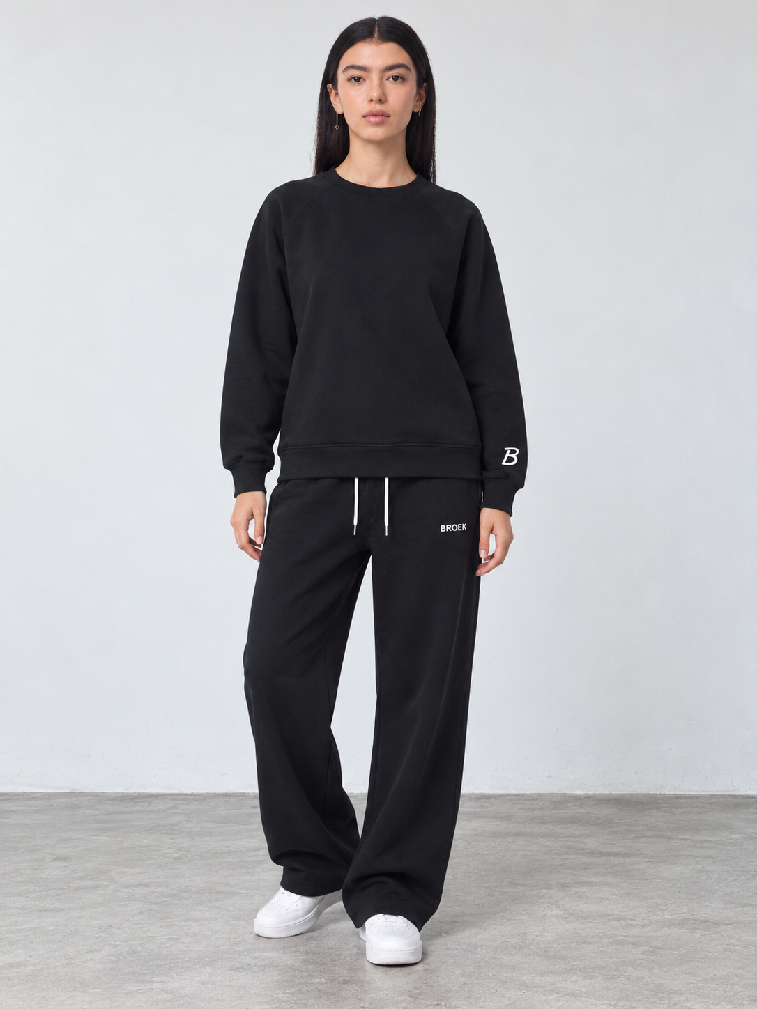 CS02 full outfit, crewneck fully untucked, female model wearing M