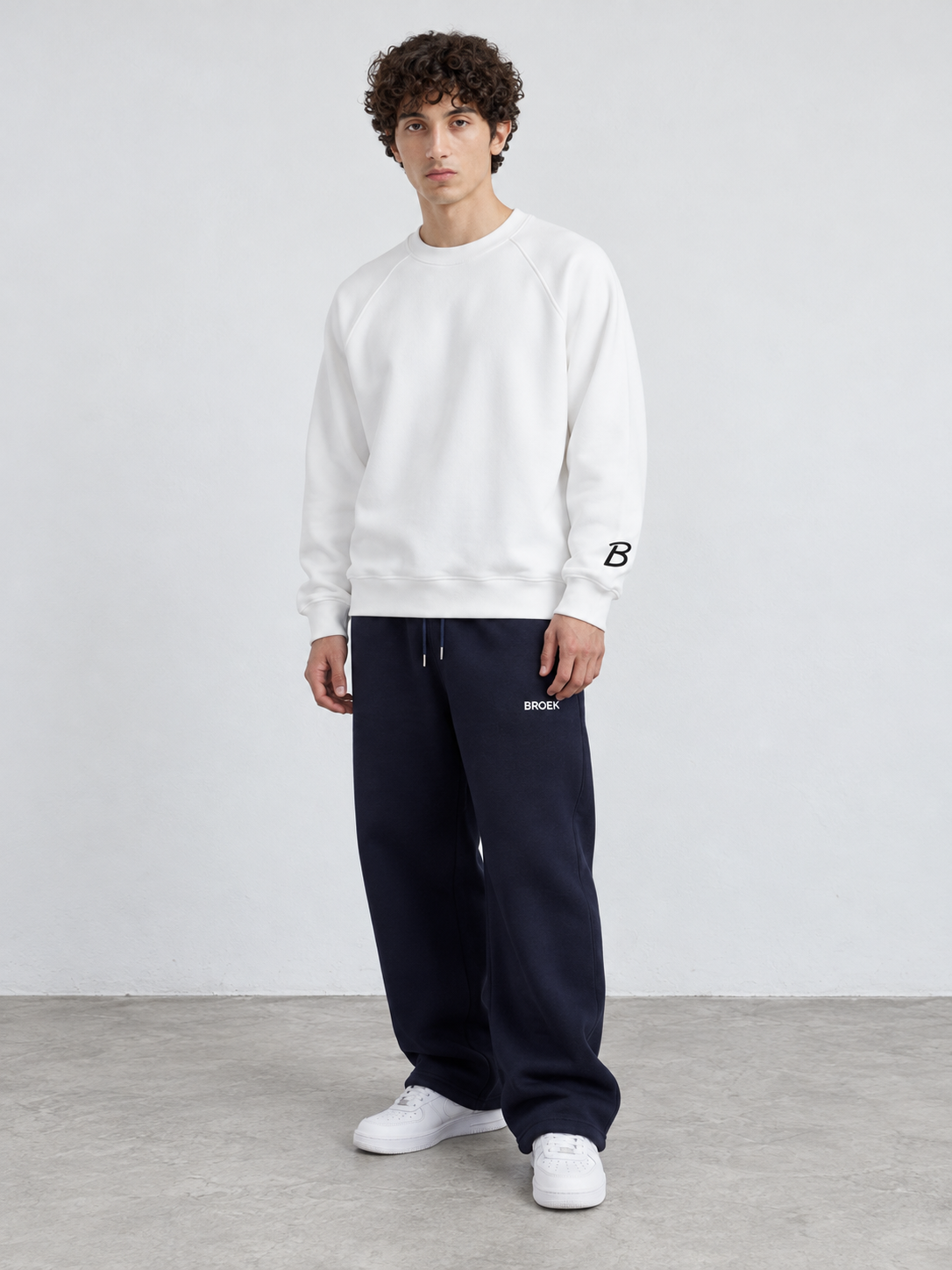 CS05 full outfit, crewneck fully untucked, male model wearing M