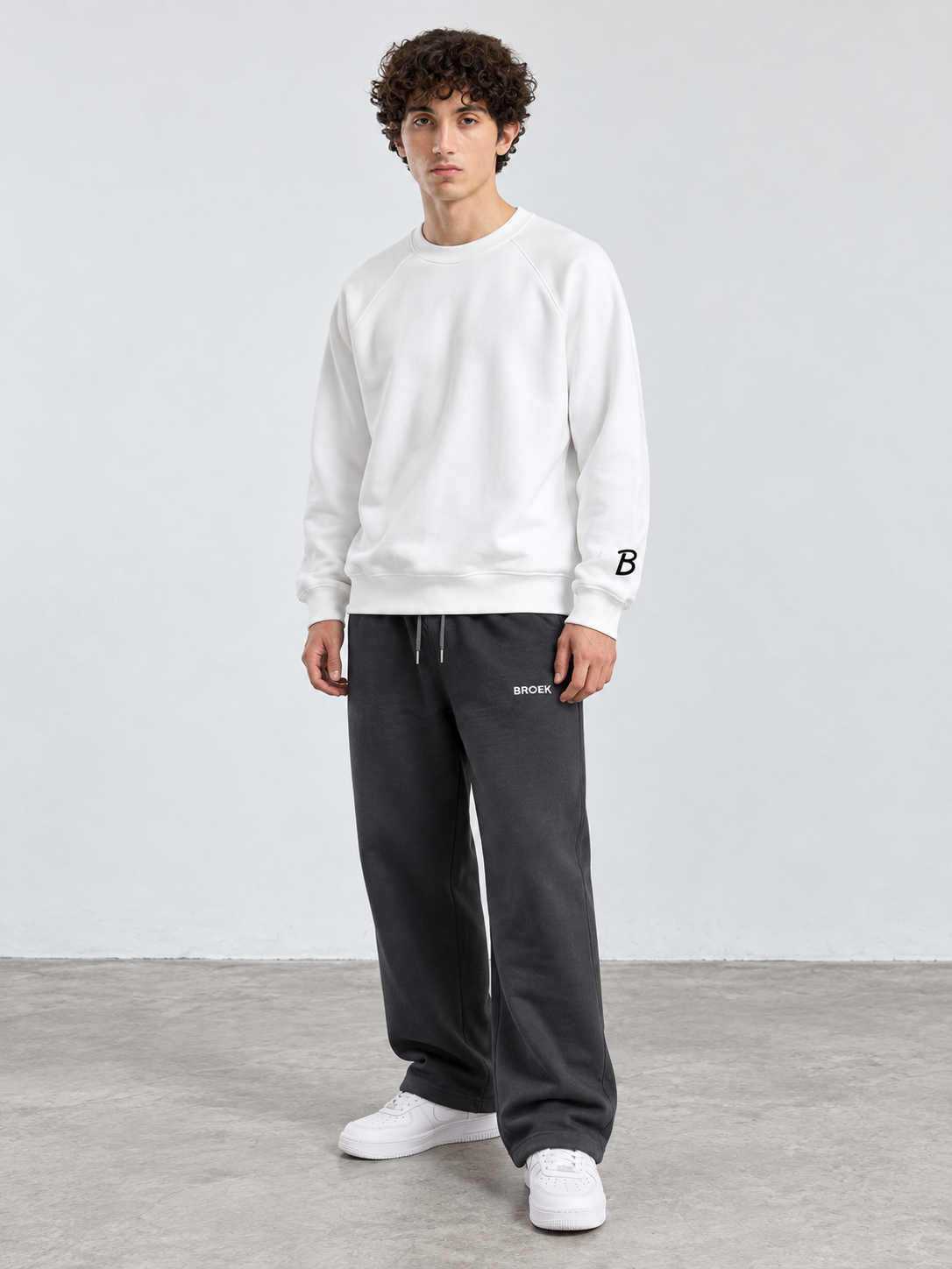 CS05 full outfit, crewneck fully untucked, male model wearing M