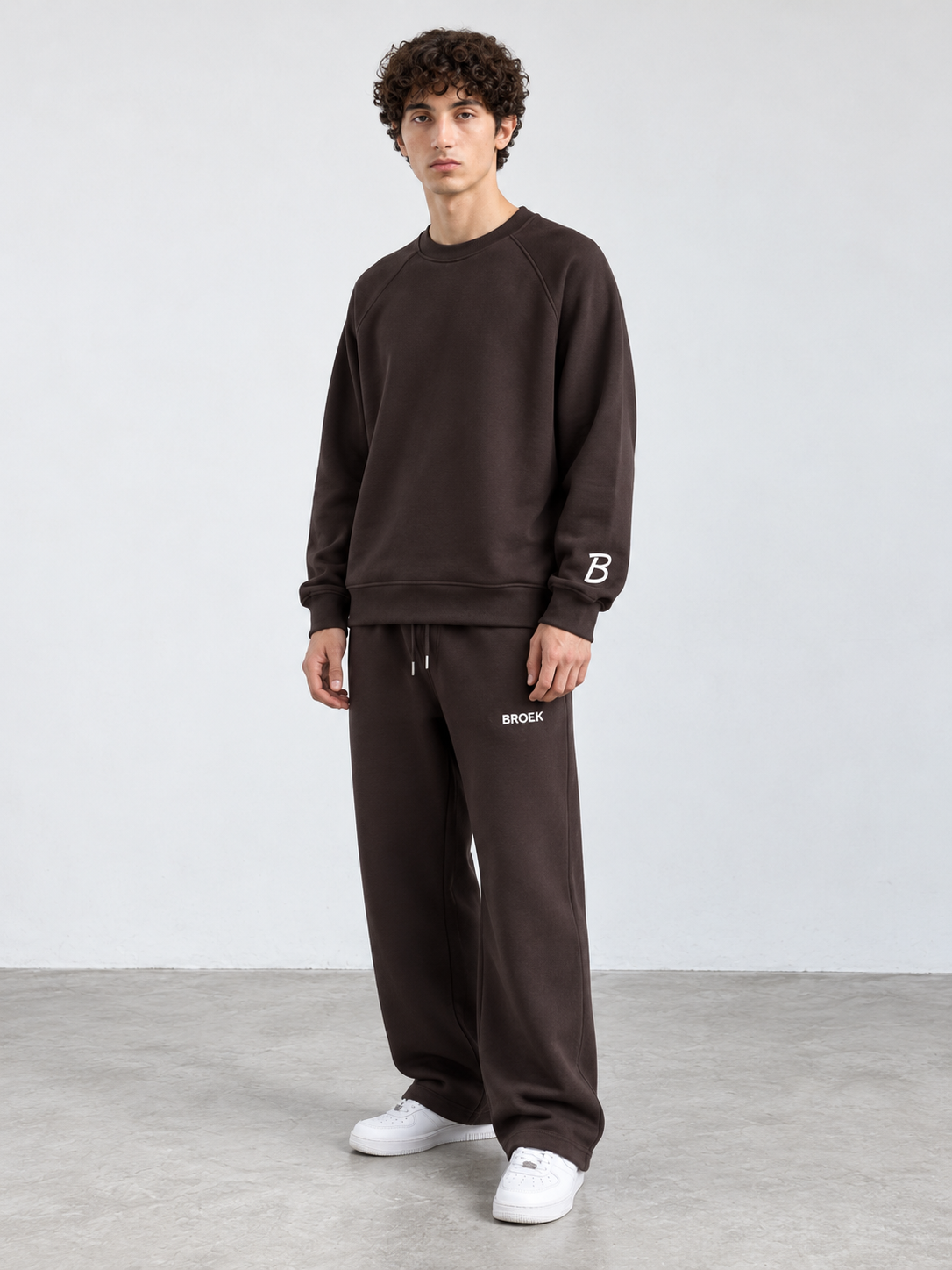 CS06 full outfit, crewneck fully untucked, male model wearing M