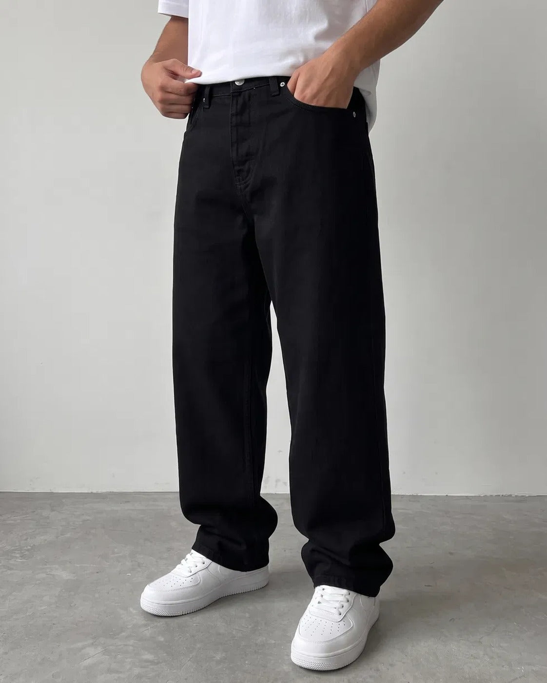 BROEK jet black relaxed fit denim jeans - front view