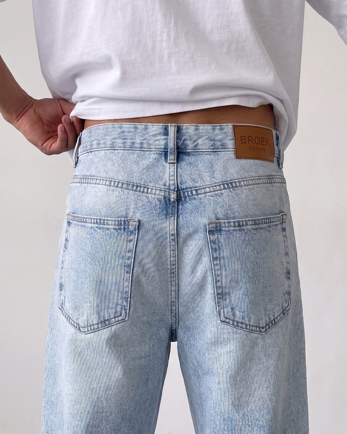 BROEK light blue relaxed fit denim jeans - back waistband with BROEK DENIMS leather patch