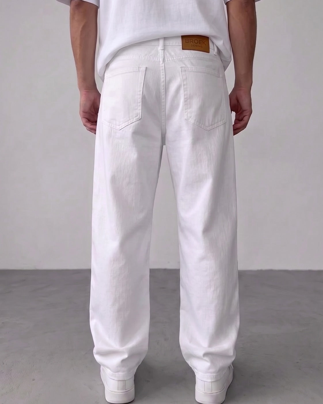 BROEK white relaxed fit denim jeans - back view with leather patch