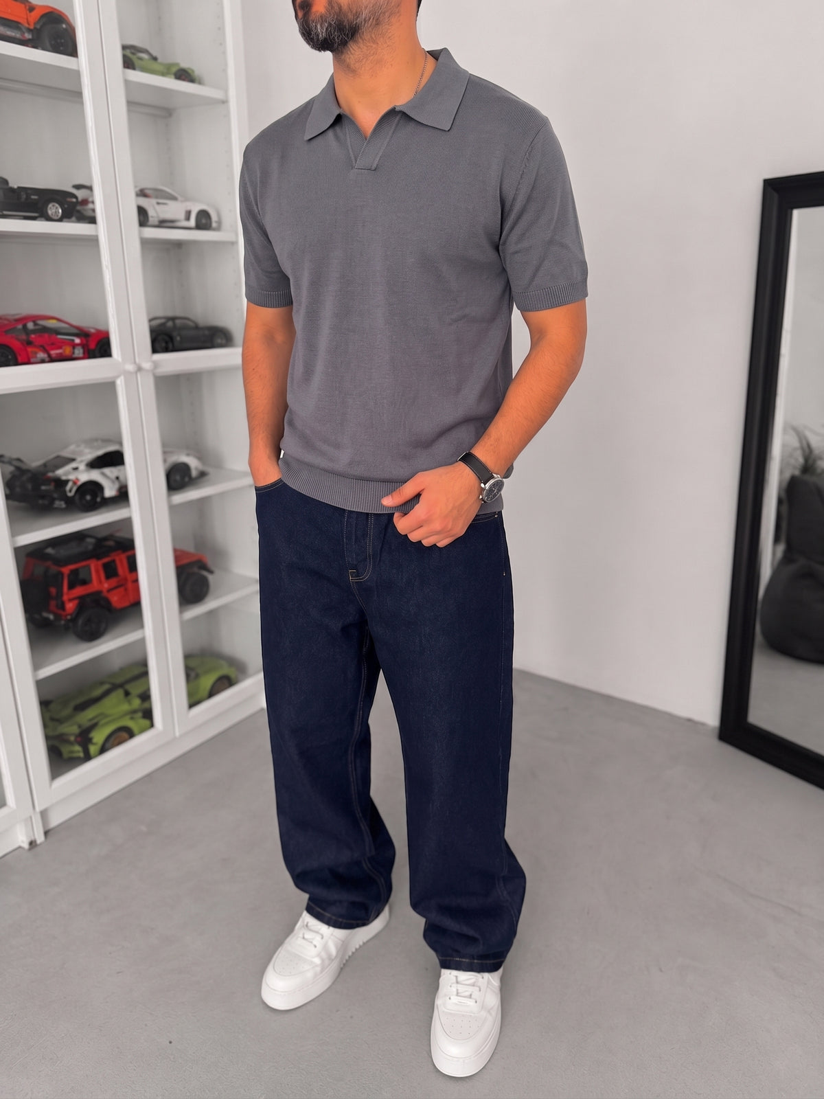 Men's dark grey knitted polo T-shirt — alternate styling view