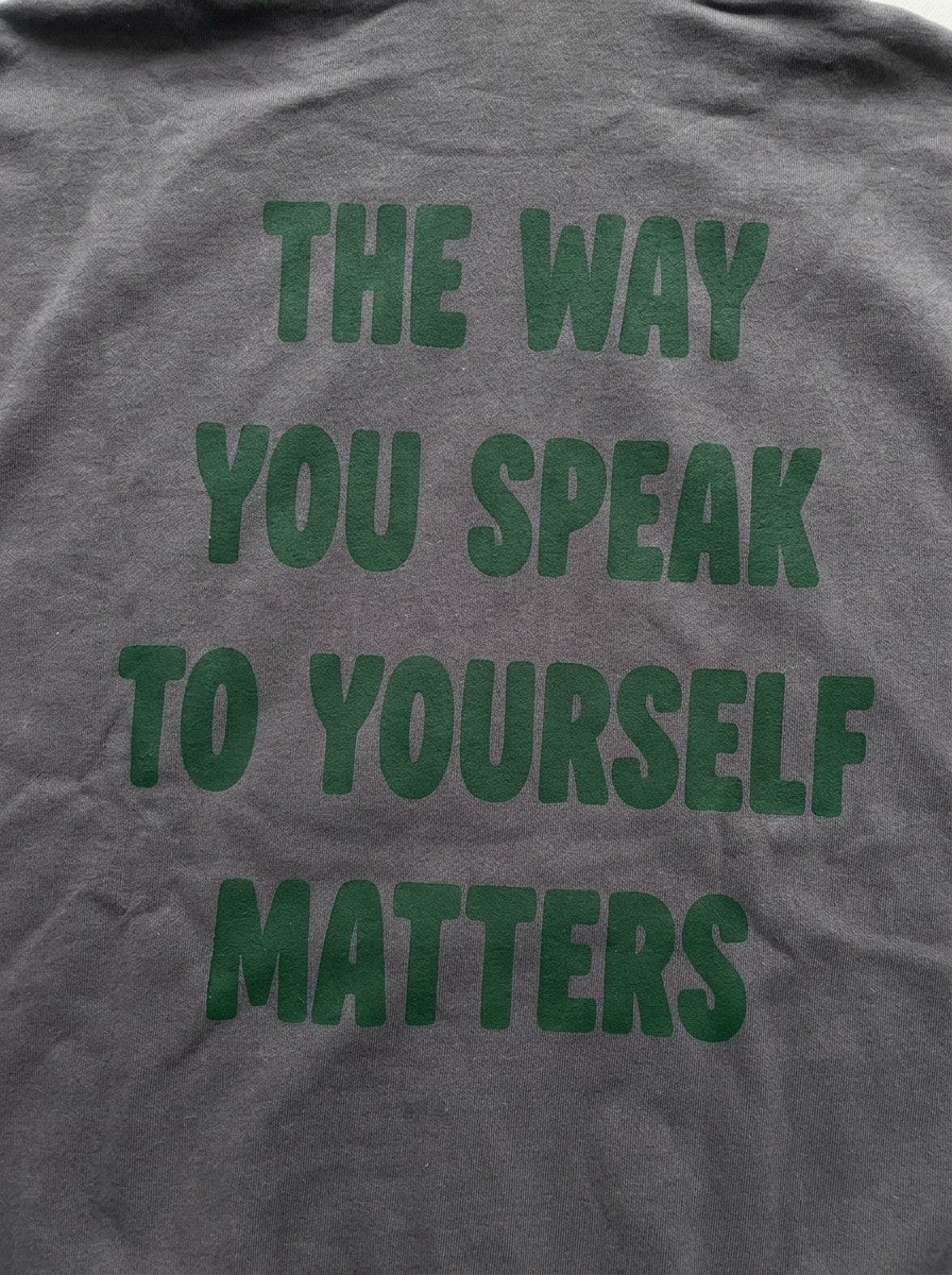 The Way You Speak Hoodie - Smoked - back print close-up