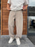 Beige relaxed-fit denim jeans by Broek in a warm beige wash