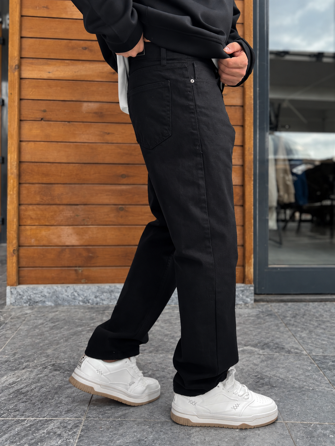 Jet Black Relaxed Fit Denim Jeans by BROEK, rear side view