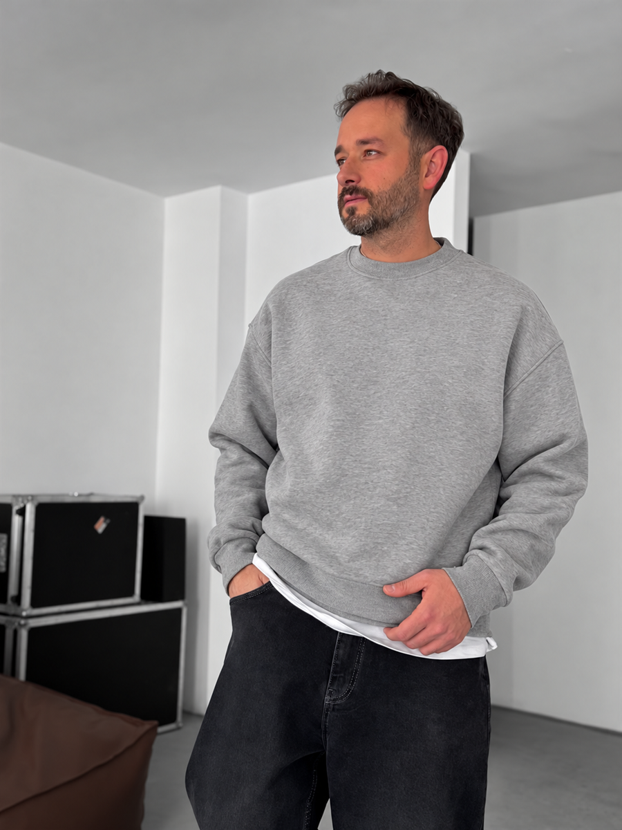 Grey melange oversized crewneck sweatshirt, close front view