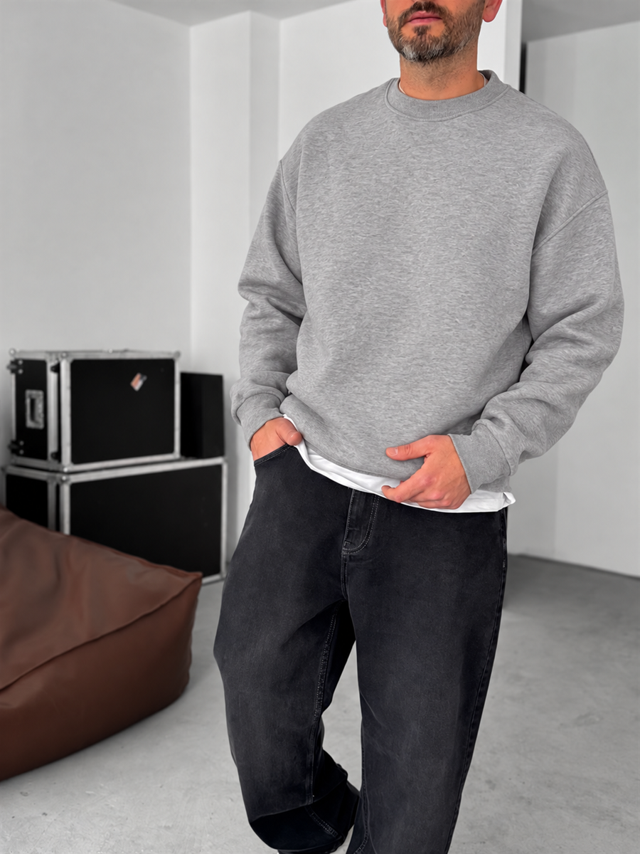 Grey melange crewneck sweatshirt, fabric and cuff detail