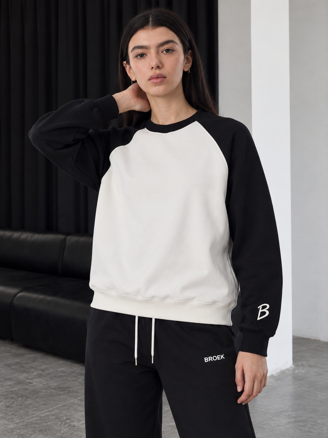 Two-Tone Boxy Sweatsuit – White & Black / Black — crewneck three-quarter view.