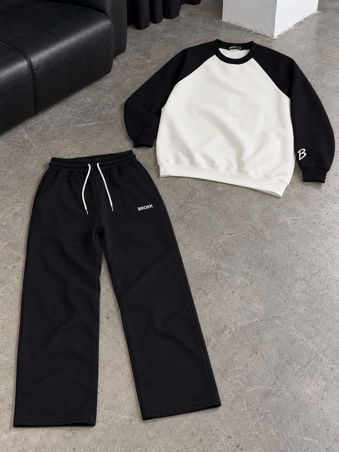 Two-Tone Boxy Sweatsuit – White & Black / Black — complete outfit flat lay.