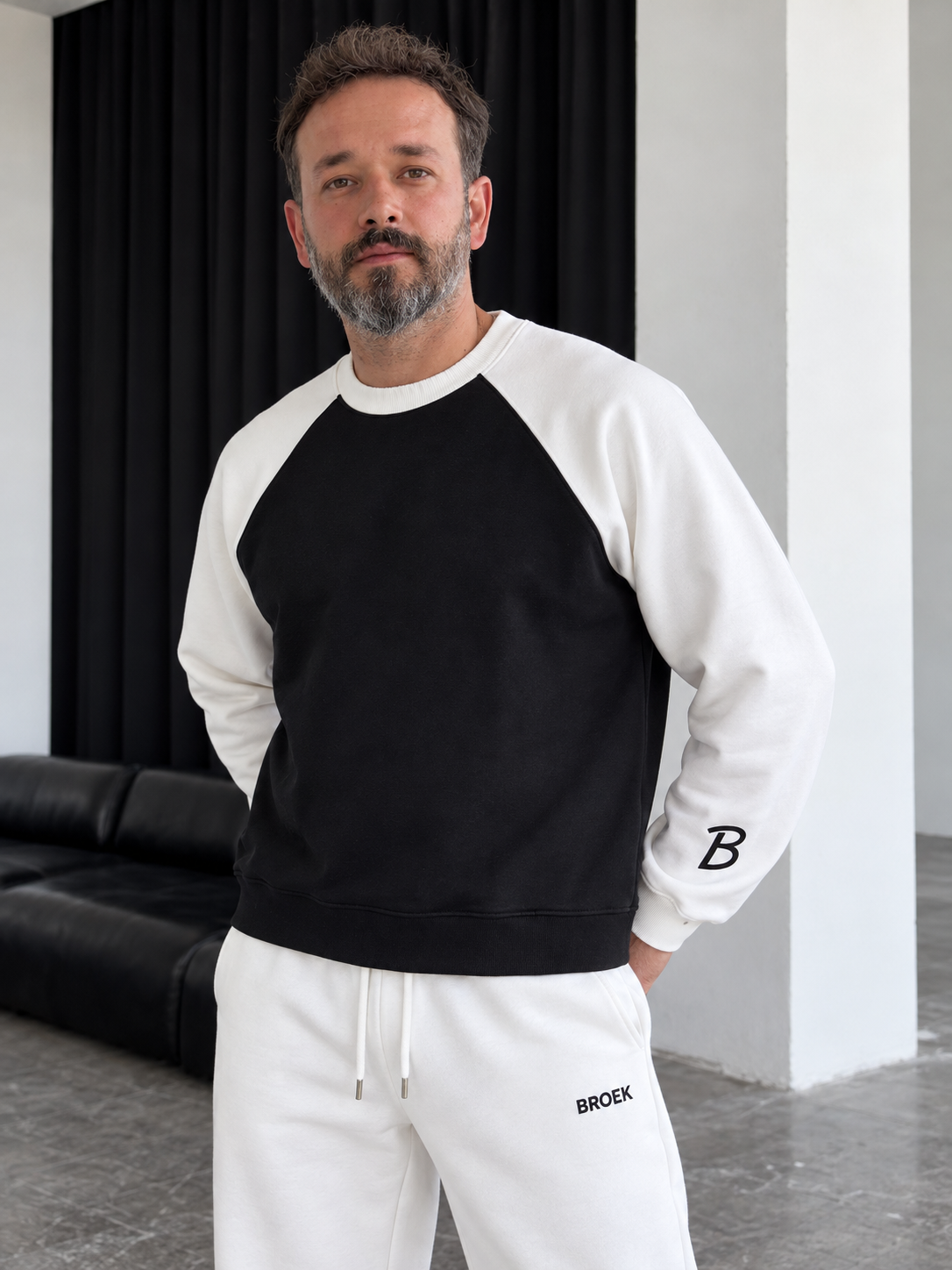Two-Tone Boxy Sweatsuit – Black & White / Off-White — crewneck three-quarter view.