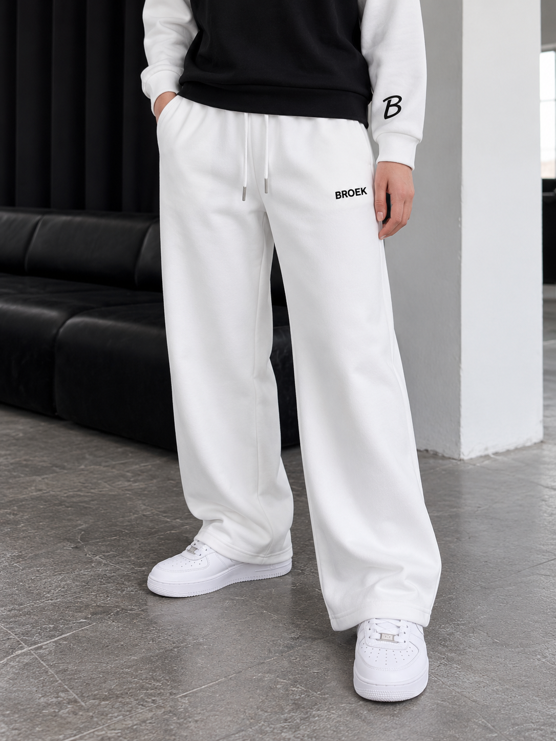 Two-Tone Boxy Sweatsuit – Black & White / Off-White — sweatpants three-quarter view.