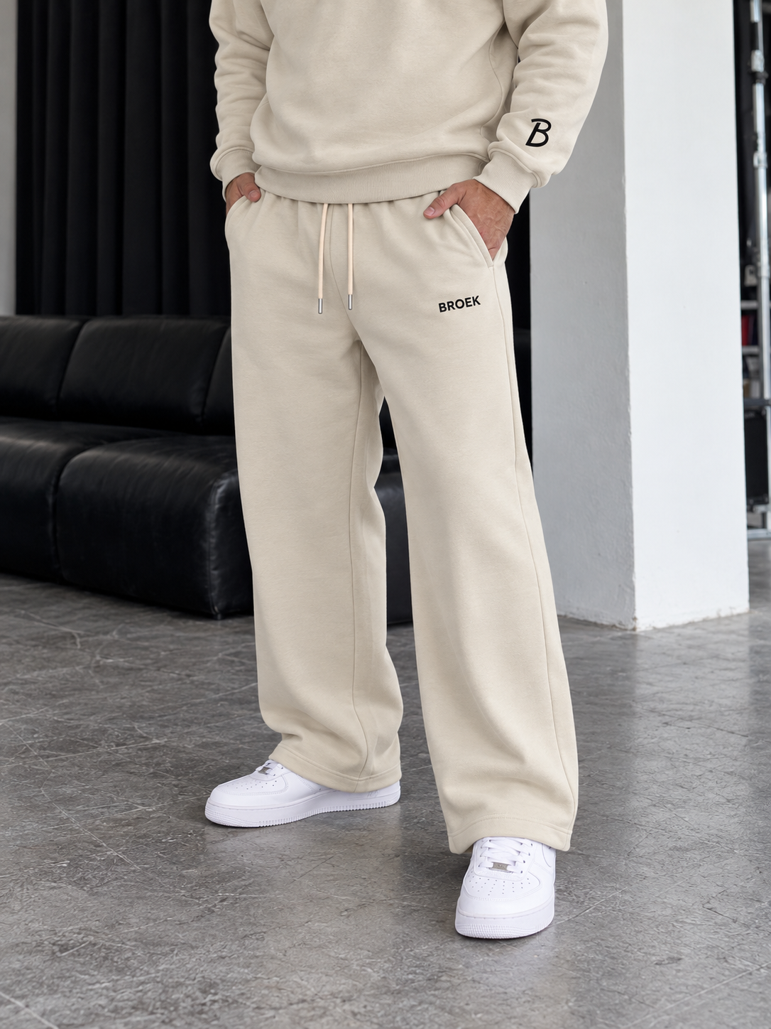 Boxy Sweatsuit – Beige — sweatpants three-quarter view.