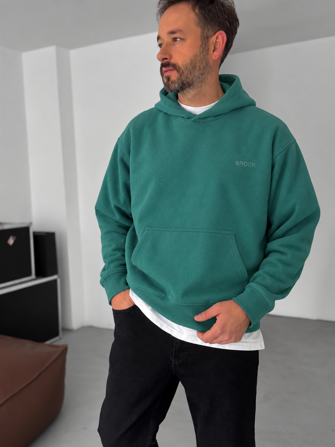 BROEK Olive Green oversized hoodie — three-quarter view