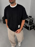 Distressed Texture Tee – Black front view
