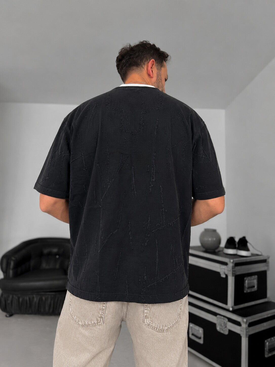 Distressed Texture Tee – Black styled back view