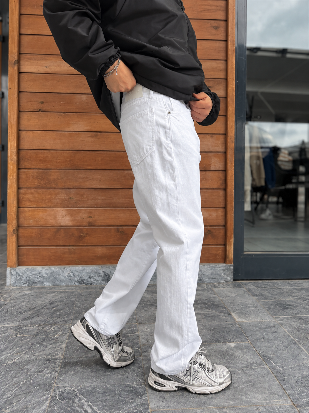 White Relaxed Fit Denim Jeans by BROEK, side and back view