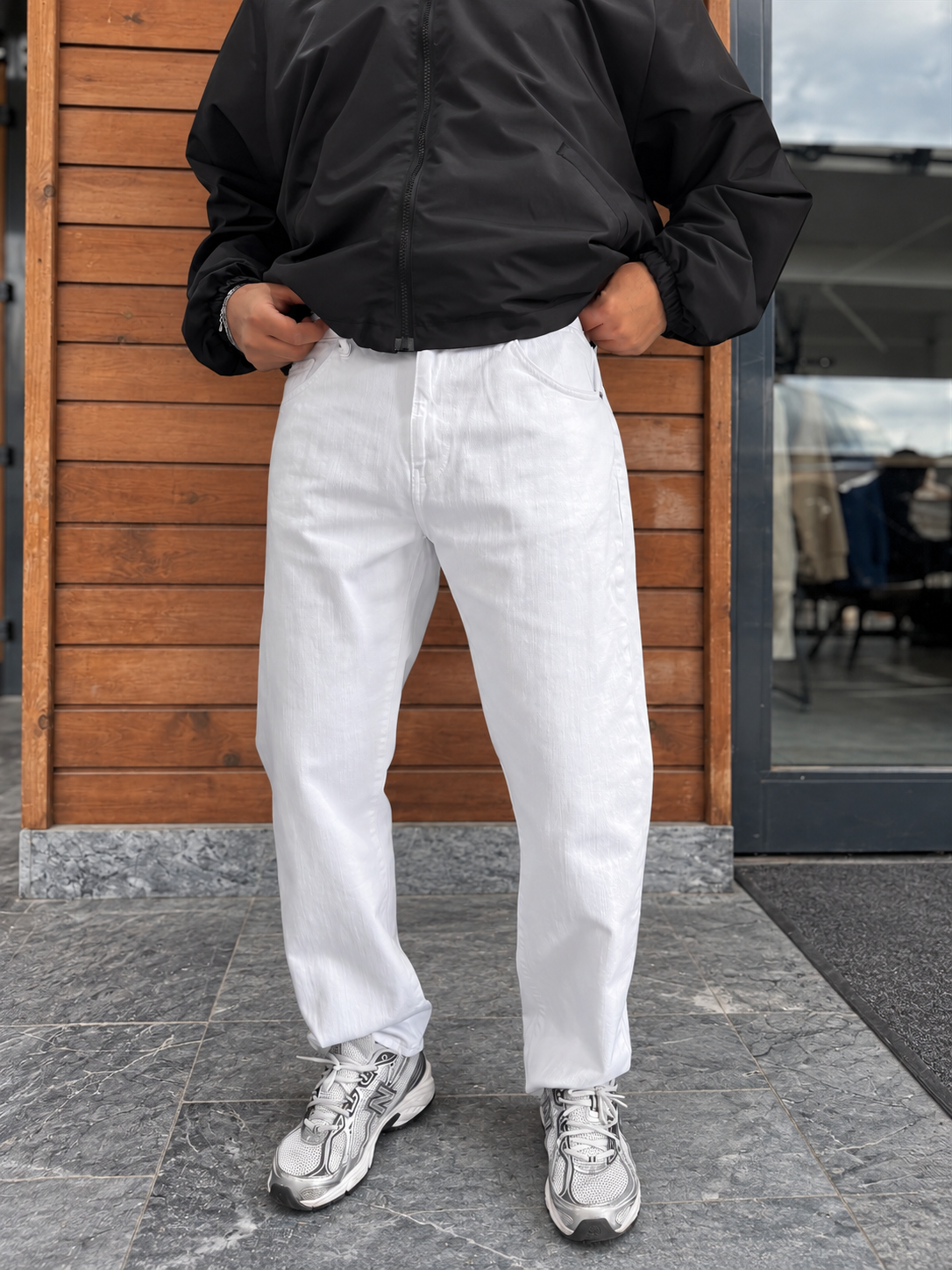 White Relaxed Fit Denim Jeans by BROEK, straight-on front view